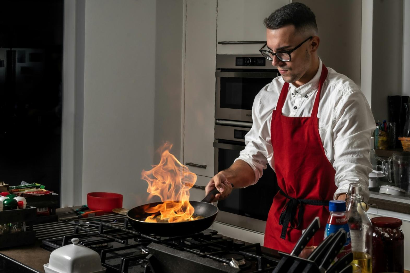Chef demonstrating knife technique during live seminar